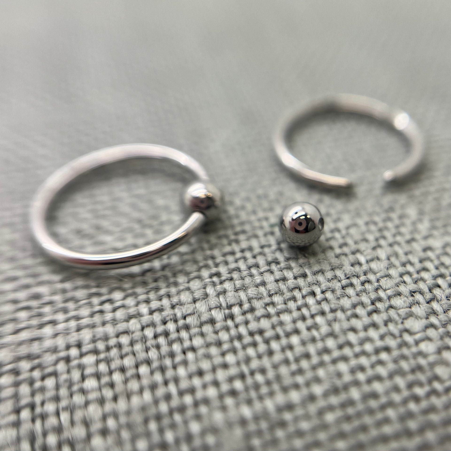 Pair, 18g Stainless Steel Captive Bead Rings. Perfect polish. Clearance Tribal Expression Jewelry