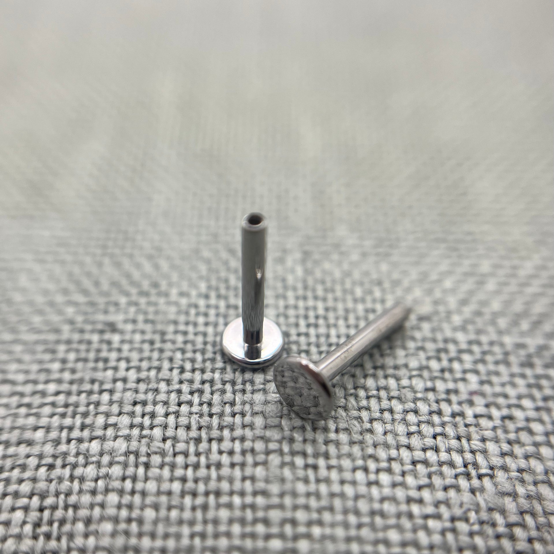 Hand polished body jewelry 