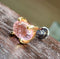 4mm x 6mm  pink tourmaline set in 14kt  yellow gold. Truly amazing one of a kind piece