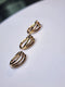 Solid 14kt gold triple stacked seam ring w/ twisted center band