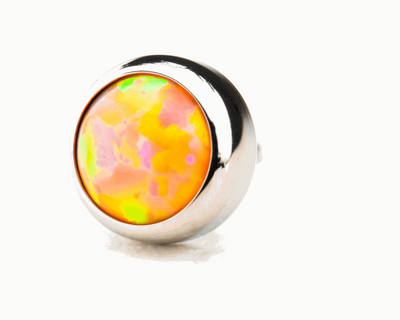 Pink and orange synthetic opal in a polished titanium threadless setting