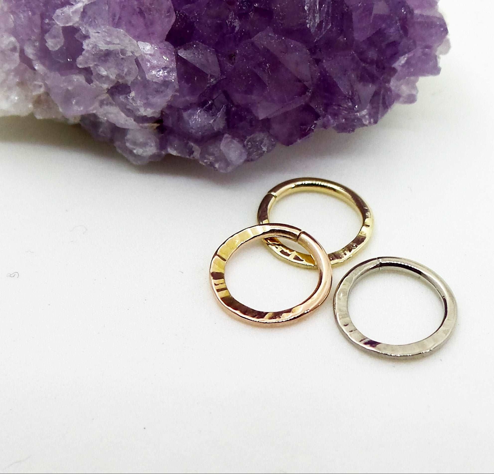 solid 14kt yellow, rose and white gold textured design seam. Hammered pattern