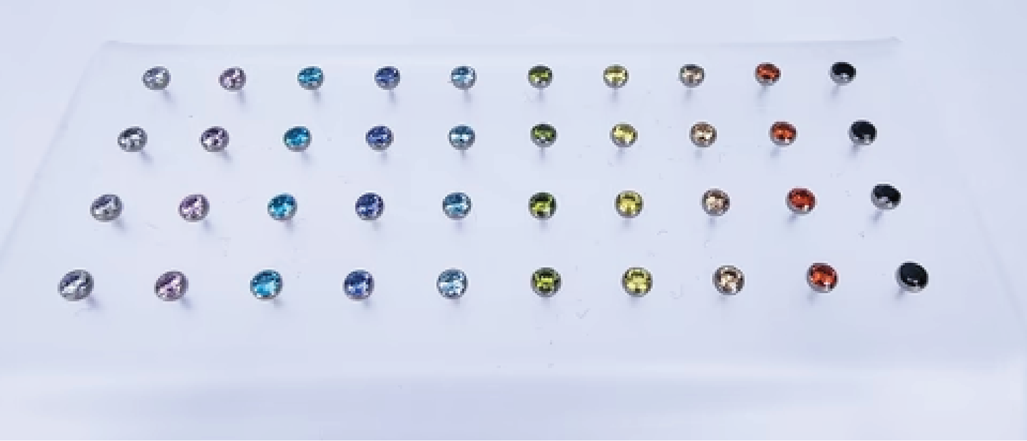 Titanium Bezel set Cubic Zirconias threadless coulored gemstones. 