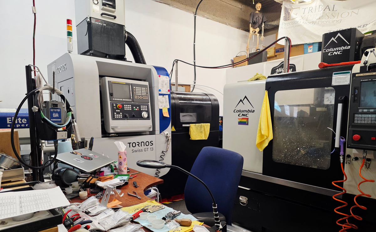 CNC machines and a workbench in the Tribal Expression jewelry workshop